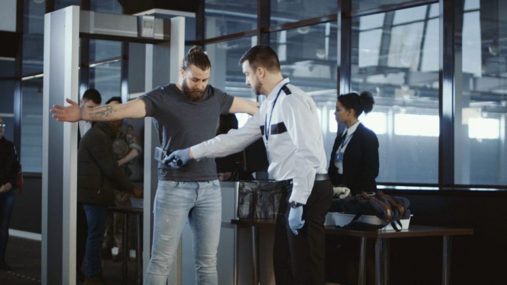 A person going through the airport security
