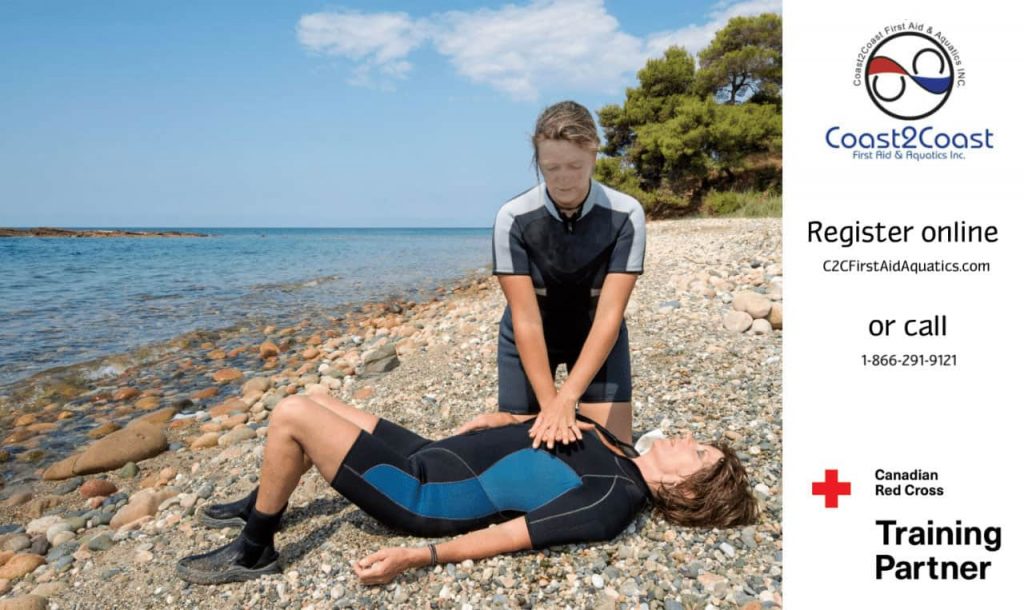 A person in a wetsuit performs CPR on another person lying on a rocky beach. The backdrop features a serene view of the ocean and trees. The image includes contact details for Coast2Coast First Aid & Aquatics, a Canadian Red Cross Training Partner.