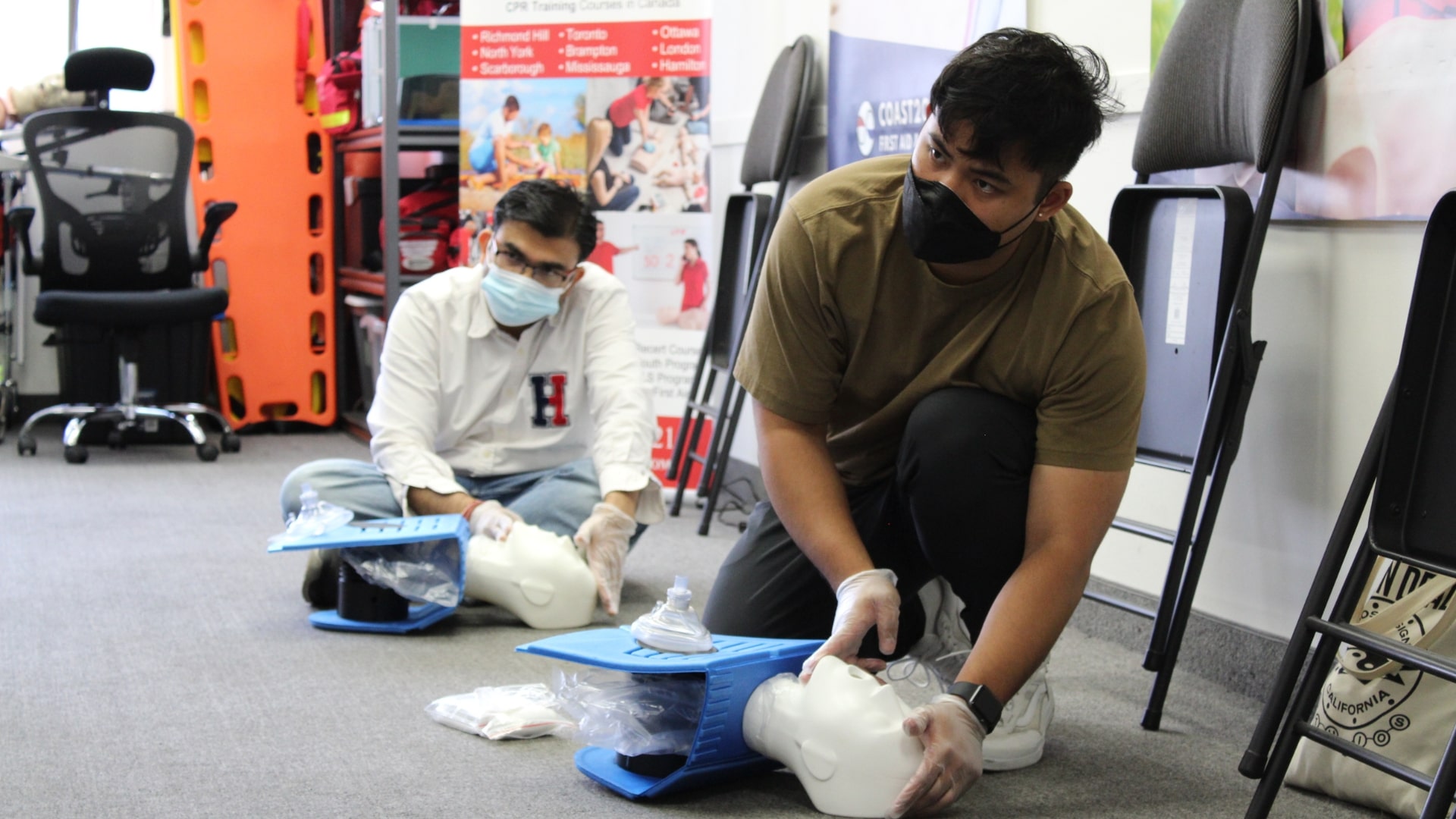 People training in a first aid course
